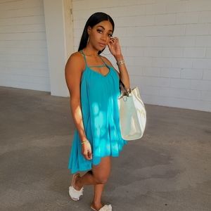 Flowy mini dress.   ( Belt sold separately)